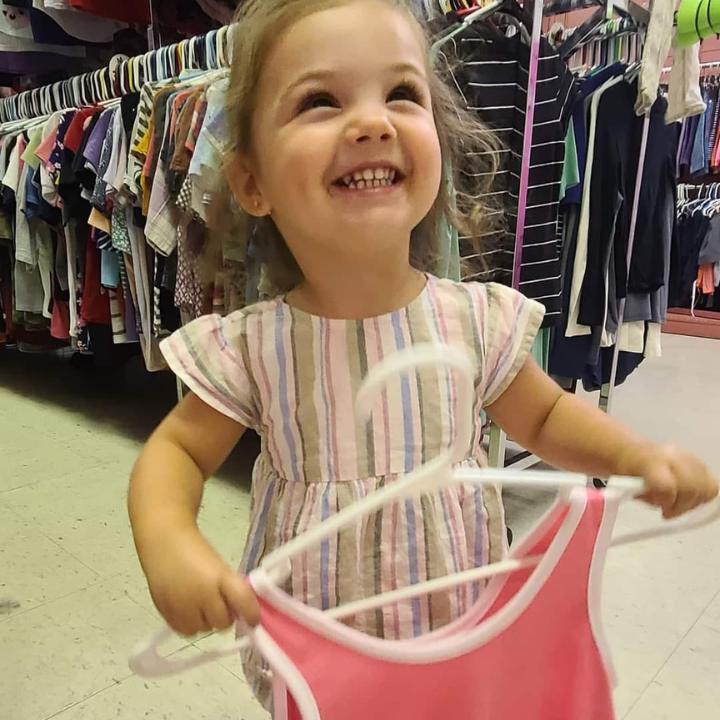Volunteer sorting clothes